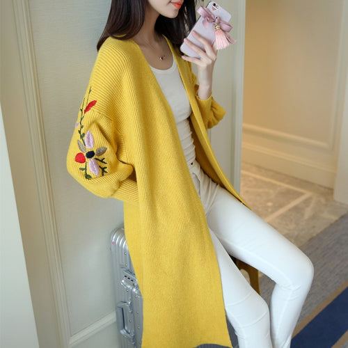 Long sweater with lantern sleeves